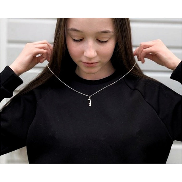 personalised silver ice skating necklace being worn