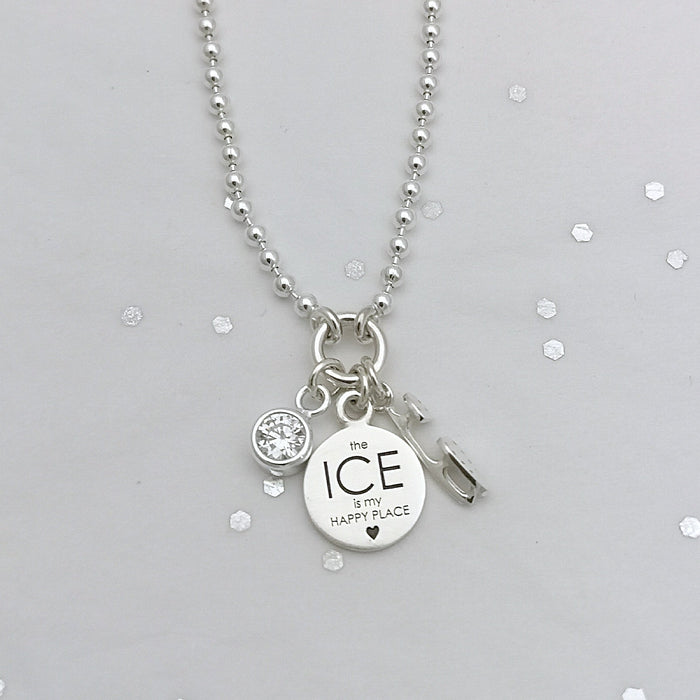 Happy Place Silver Ice Charms Bracelet by Ice Skating Jewellery on a sparkly grey background