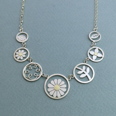 Framed Garden charms necklace in silver and 18ct gold