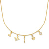 Gold necklace with various charms on a white background