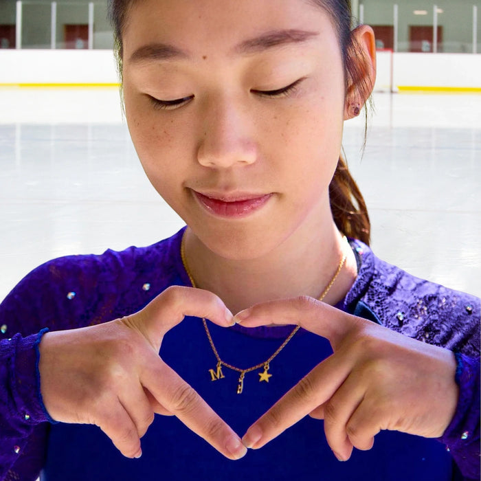 Gold Ice Skating Multi Charm Necklace