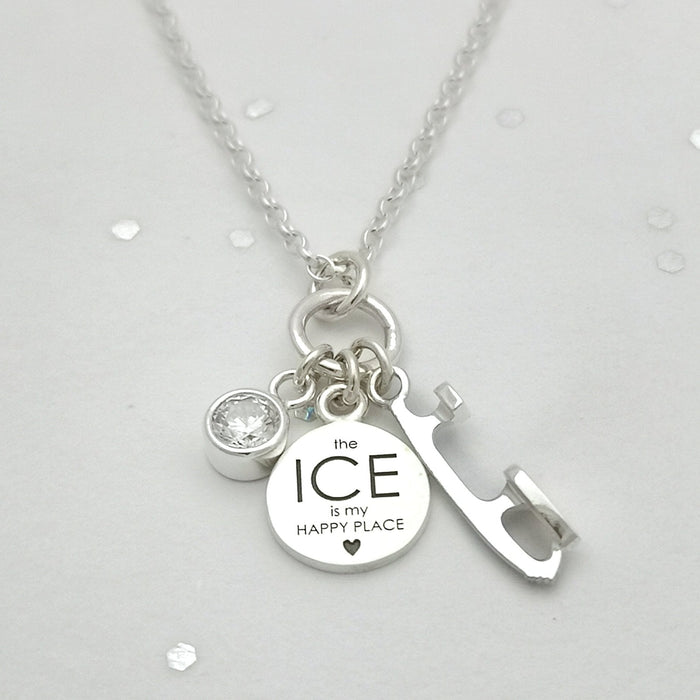 happy place ice charms necklace on a sparkly background