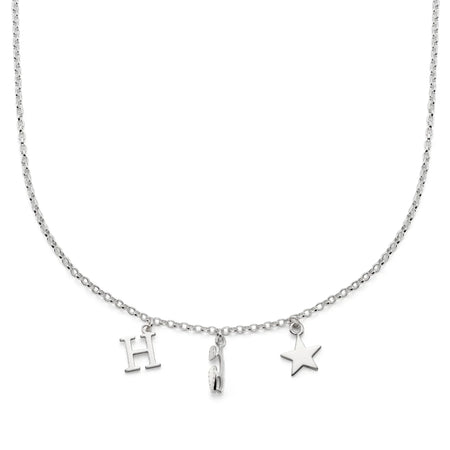 Silver necklace with 'H', ice skate blade, and star charms on a white background