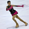 Figure skater in a sparkly dress wearing a personalised silver ice skating necklace