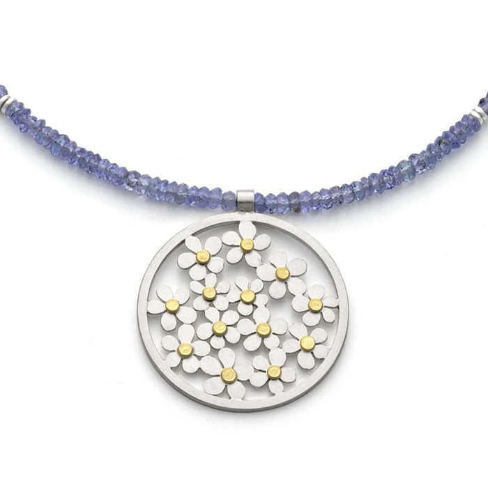 Forget me not necklace with tanzanites | Diana Greenwood Jewellery
